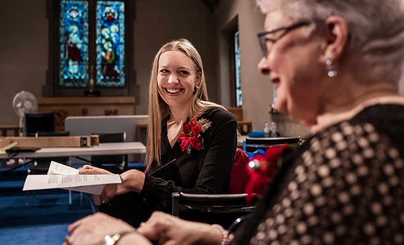 candid photo of two church choir members