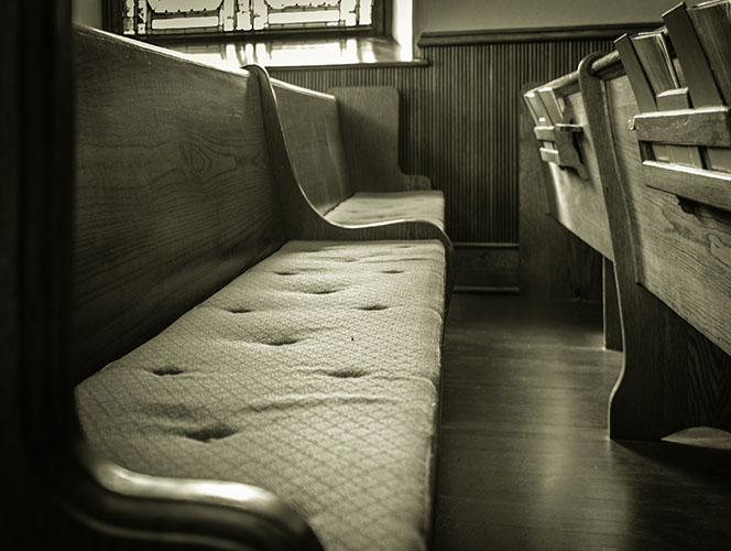 Church pew with very flat cushioning