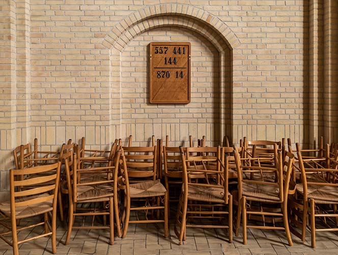 Haphazardly stored chairs in a church atrium