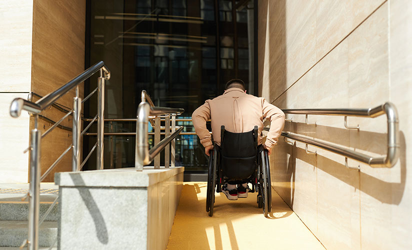 Person using an accessibility ramp