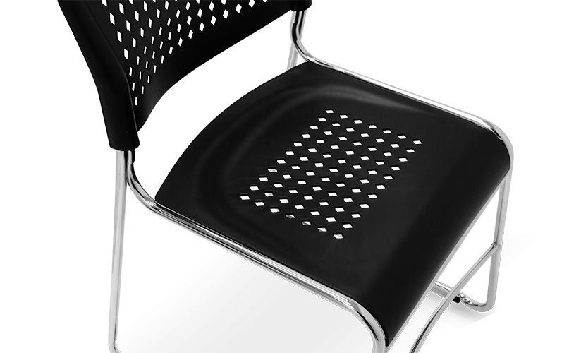 Close-up of the perforated seat and back of the Super Stacker